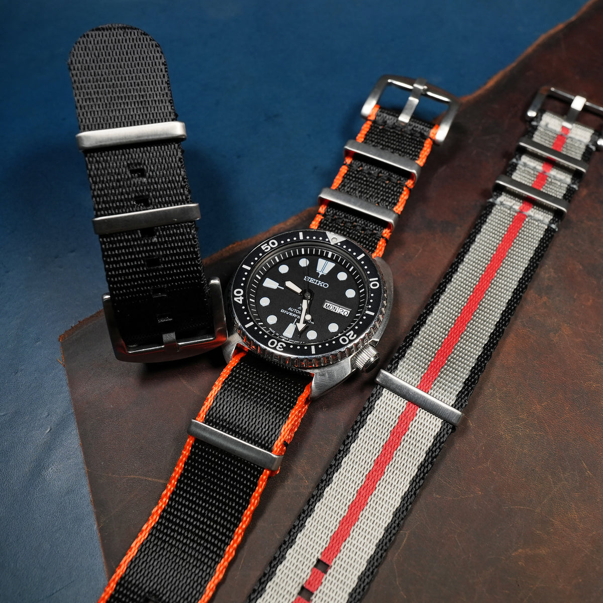 Seat Belt Nato Strap in Black with Orange Accent