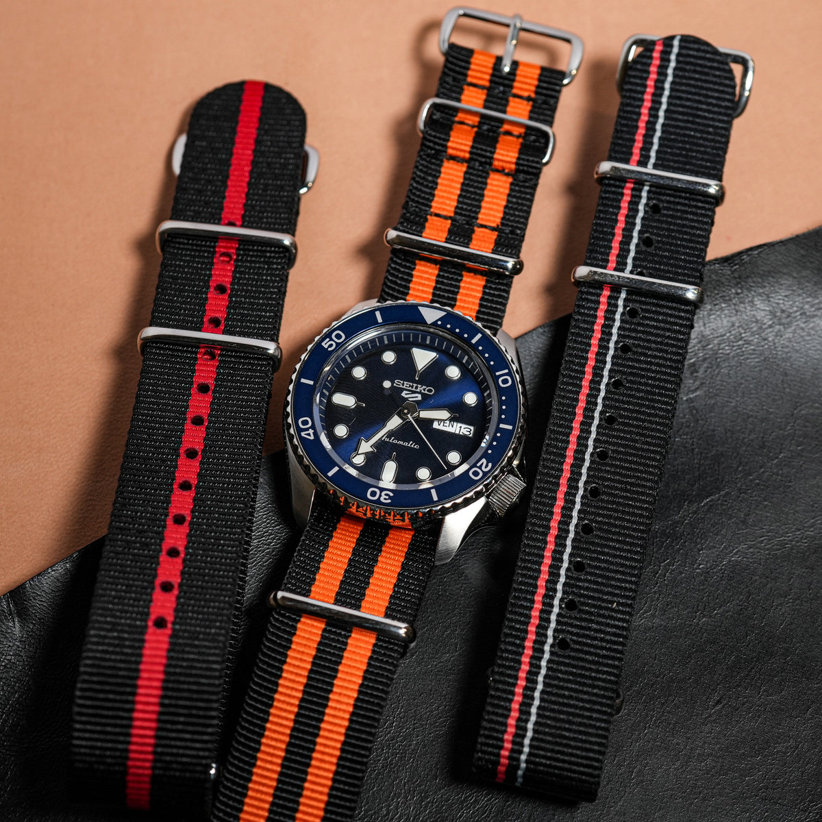 Premium Nato Strap in Black Orange Small Stripes